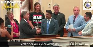 Front: Nashville Vice Mayor Jim Shulman joins Dr. Shamender Talwar at the Metro City Council meeting for the "Unit Microphone" presentation.