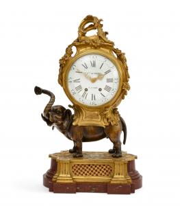 Mid-18th century Louis XV style gilt and patinated bronze elephant-shaped mantel clock by Charles du Tertre of Paris, the dial signed and the two-train movement ringing on a bell, 23 ½ inches high (est $3,000 - $5,000) .