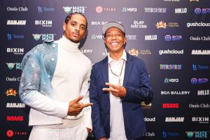 Cordell Broadus (Snoop Dogg’s son and owner of Bored Ape avatar Champ Medici) poses for a photo with Hip Hop icon Russell Simmons during the Champ Medici Lounge event in Singapore