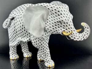 Extra large black fishnet pattern Herend elephant, just under 10 inches tall in brand new perfect condition, with no blemishes (est. $2,500-$5,000).