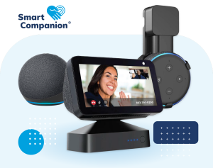 SmartCompanion equipment shown including an Echo Show smart speaker with video touchscreen and battery back-up, Echo Dot voice-controlled smart speaker with wall mount for the bathroom, and Gen 4 Echo Dot.