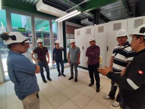 Central Bank officers at Ocho Sur's renewable power plant in Ucayali