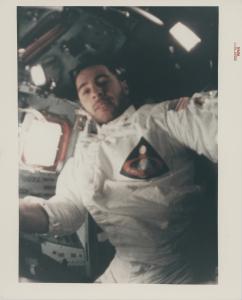 Lot 195: The first selfie in lunar orbit: William Anders during an intra-vehicular activity inside the Apollo 8 command module in orbit around the Moon, NASA [Apollo 8]