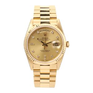 Rolex Day-Date “President” wristwatch, Ref.  18038, circa 1988, with 18kt yellow gold case and bracelet and champagne diamond dial, serviced by Rolex August 2002 (estimated CA$28,000-35,000).