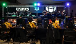 Gamers from Esports Festival Wichita's last event play PC games in the arena, and also on the main stage.