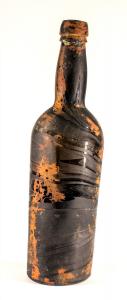 Lots 1053-1056 are beer bottles ranging from 8 inches to 9 ½ inches tall. This one (lot 1056) has an exterior that’s swirled with iron oxide coating (Minimum Bid: $100).