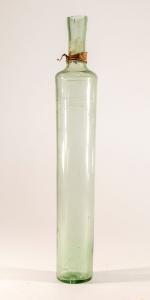 Lot 1067 is a pale green, likely hand-blown, thin-walled cylindrical flask with a flared top, 8 ¾ inches long, unusual in shape, suggesting a perfume bottle (MB: $250).