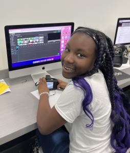 Girl works on video editing project