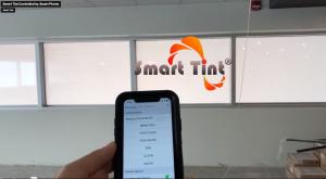 Smart Tint switchable glass smart film being controlled by smart phone app