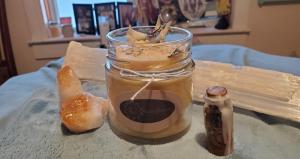 Artisan Ashley Laura Wyatt upcycles used Wendell Estate Honey elegant Italian glass jars into Moonflower natural beeswax candles