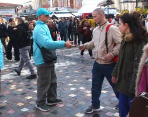 Handing out the Truth About Drugs booklets in the popular market in Monastiraki