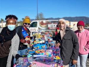 Volunteers prepare to distribute toys at Project Boon and Grocery Outlet's 2021 Christmas Event