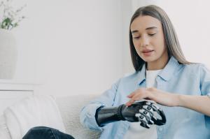 handicapped women having bionic hand