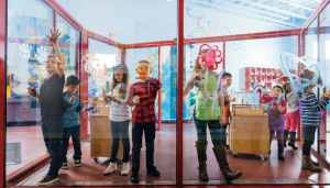 group of kids interacting at ImagineU Museum