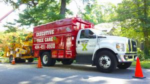 Executive Tree Care truck with chipper