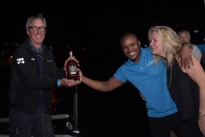 Kamal Powell (center), Regional Marketing Manager Appleton Estate and Lynda Langford, Pineapple Cup representative welcome Jim Murray to Jamaica's shores with an Appleton Estate 12 Year Old Rare Casks.
