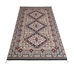 Handwoven wool Navajo Klagetoh rug made by Eva Marie Begay (American/Navajo, active in the late 20th/early 21st century), 11 feet by 5 feet 9 inches (est. $4,000-$6,000).