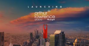 Image shows a beautiful landscape of a business hub from Saudi Arabia, with text highlighting that Arthur Lawrence announces the launch of Arthur Lawrence Arabia.