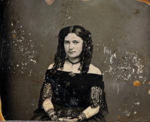 The unidentified young woman in this 19th-century daguerreotype photograph is wearing a choker and brooch of the era. The photo was recovered from a pile of coal in a debris field where the S.S. Central America sank in 1857 and the scientific mission reco