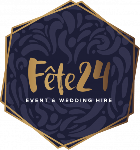 Logo of Fete24, a wedding and event services company based in the South West of France. The logo features the company name in stylized, elegant font, with a decorative design element that resembles a flower or sunburst. The color scheme is primarily navy 