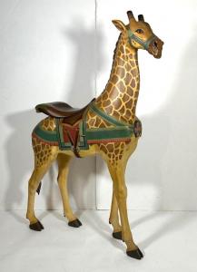 Carved and painted carousel giraffe, crafted circa 1910 by Gustav and William Dentzel, professionally restored, 64 ½ inches tall with inset glass eyes (est. $5,000-$10,000).