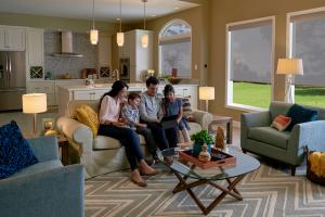 Living areas with layered lighting can be adjusted to provide the proper light levels for specific tasks and the amount of natural light at different times of day. Photo courtesy of Lutron Electronics.