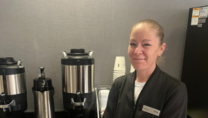 staff member smiling at work at Wingate Toldeo