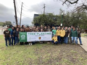 Dozens of UPS volunteers and nearby Dallas residents helped at Craddock Park's tree planting