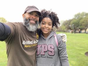 E.J. Lunkin, a longtime employee of UPS, & his daughter assisted with the planting.