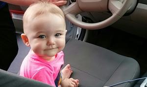 Child behind the wheel of an auto