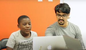 Zebra Robotics coach and student