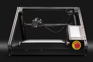 3D belt printer One Pro from front, black frame, silver print bed, triangular shape, black background