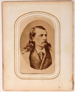 Carte de visite of Buffalo Bill Cody, made by the Theatrical Photography Co., depicting Buffalo Bill in his younger years, circa 1870s, in a nice 4 inch by 5 inch frame (est. $20,000-$50,000).