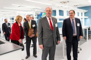 Rensselaer Polytechnic Institute President Martin A. Schmidt ’81, Ph.D., and Center for Engineering and Precision Medicine Co-Director Jonathan Dordick, Ph.D., tour the new center during the March 29, 2023 grand opening in New York City.