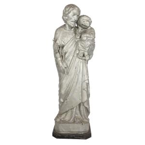 Circa 1880 exterior sculpture by Louis Jobin (1845-1928) of Joseph with the Christ child holding a globe, meticulously covered in lead-tin, 57 inches tall (CA$5,015).