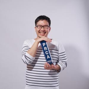 Nirote (May) Chaweewannakorn, Country Director of Gushcloud Thailand,  holds the trophy for #talkxic campaign against cyberybullying