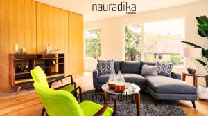 This shows a mid-century modern interior design by Nauradika.com