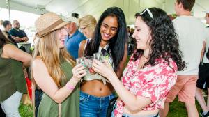 Guests enjoy a variety of wines and craft food and beverages at the 7th Annual North Fork Crush Wine & Artisanal Food Festival, June 17 at Peconic Bay Vineyards.