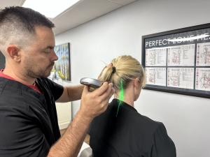 Dr. Bell using Cold Laser in West Knoxville