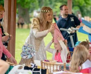 Young girls learned the ropes of being a medieval princess.