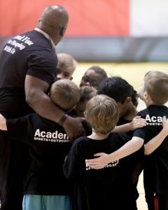 AEBL basketball summer youth camp team huddle picture from 2022