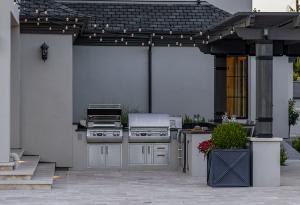 outdoor kitchen with two bbqs so there is no cross contamination for a food allergy