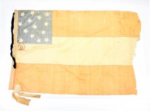 Missouri First National Confederate flag and sash belonging to Russell B. Caples, 4 feet by 6 feet, hand-sewn silk with 14 white silk stars and a silk officer’s sash (est. $5,000-$7,000).