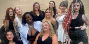 a group of women sitting together for a picture