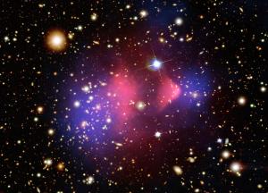 The Bullet Cluster will prove to be a bullet in the chest of Dark Matter (Pink shows X-ray emitting plasma, while blue shows mass distribution)