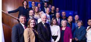 Members of the Clinton Global Initiative, including former President Bill Clinton and Hillary Clinton