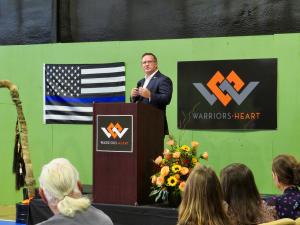 Nelson Smith, Virginia Department of Behavioral Health and Developmental Services Commissioner speaking at Warriors Heart Virginia Soft Opening on 9/11/23