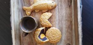 The gourmet art of enjoying mooncakes involves pairing gourmet teas with them to balance the sweetness of the rich bean and nut filled cakes much the way you would pair wine and cheese.