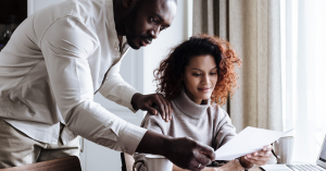 A couple reviewing their financial plan.