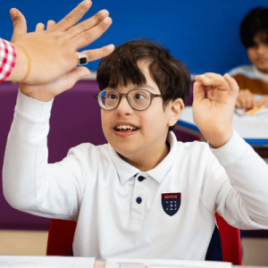BISEE student getting a high five from teacher